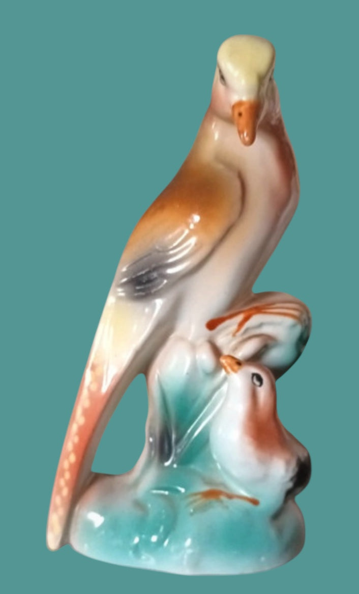 Mother and child majolica bird statue