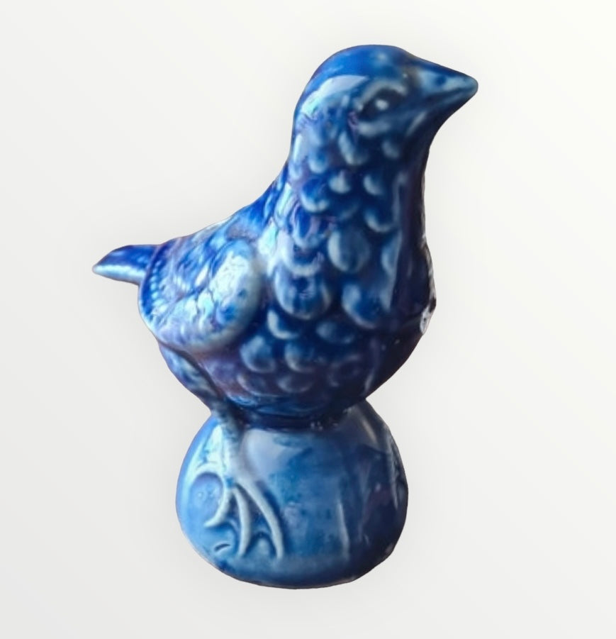 Antique majolica coin bank blue bird