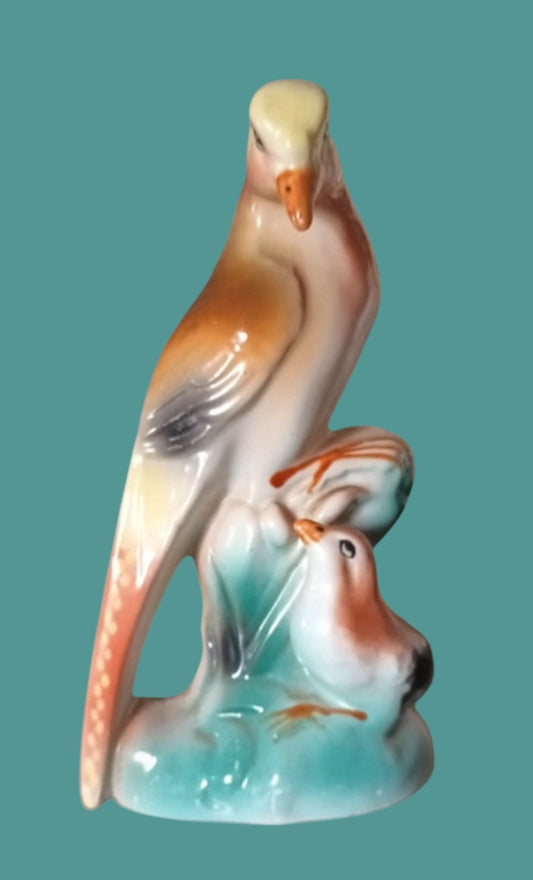 Mother and child majolica bird statue