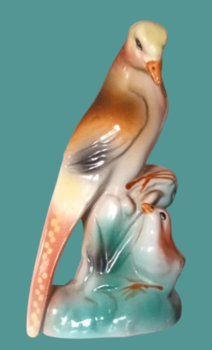 Mother and child majolica bird statue