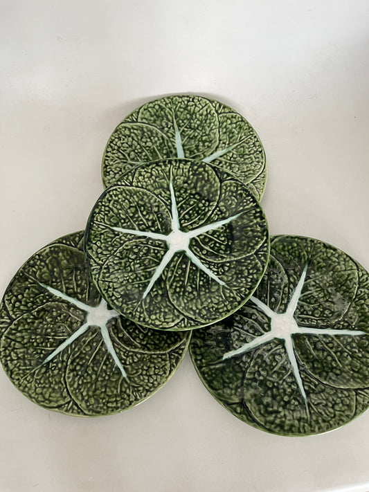 Set of 4 green antique majolica dessert plates from Portugal.