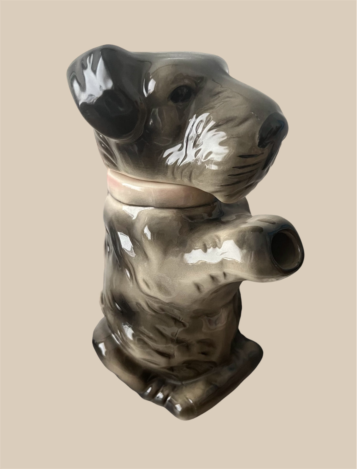 Antique porcelain teapot dog figure