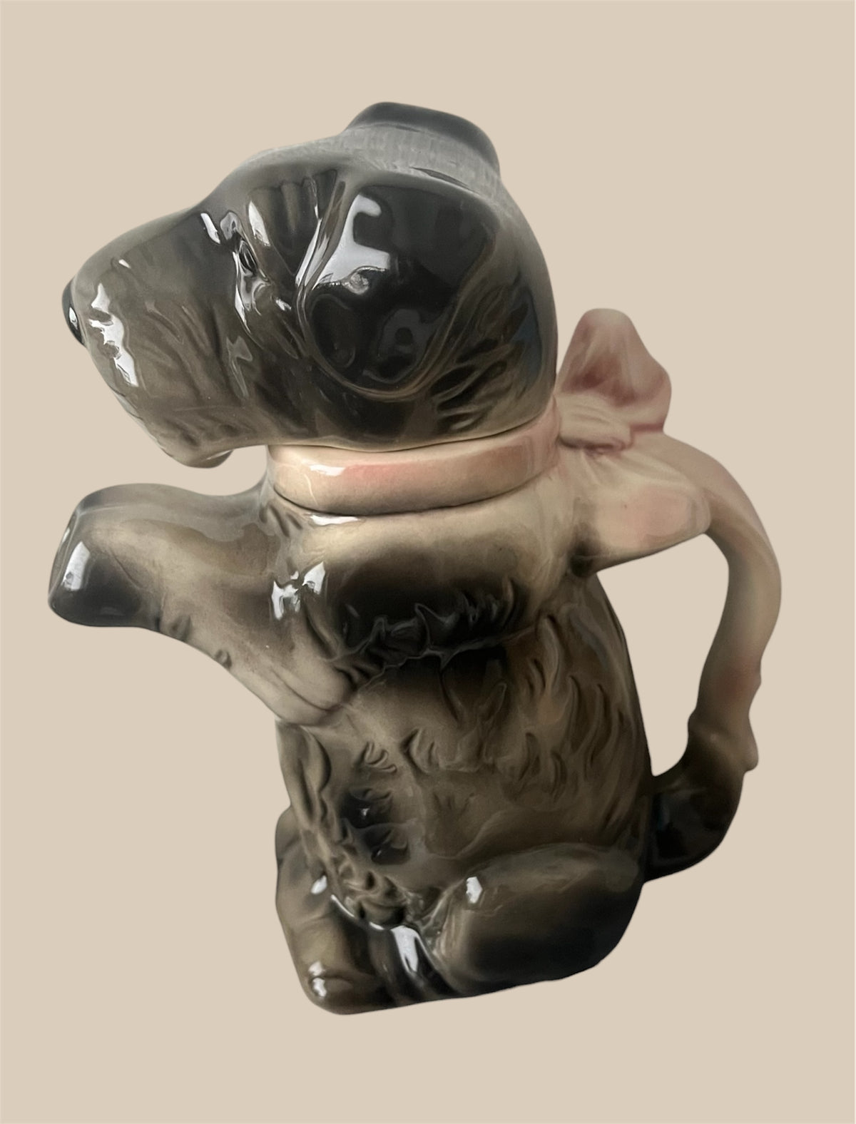 Antique porcelain teapot dog figure