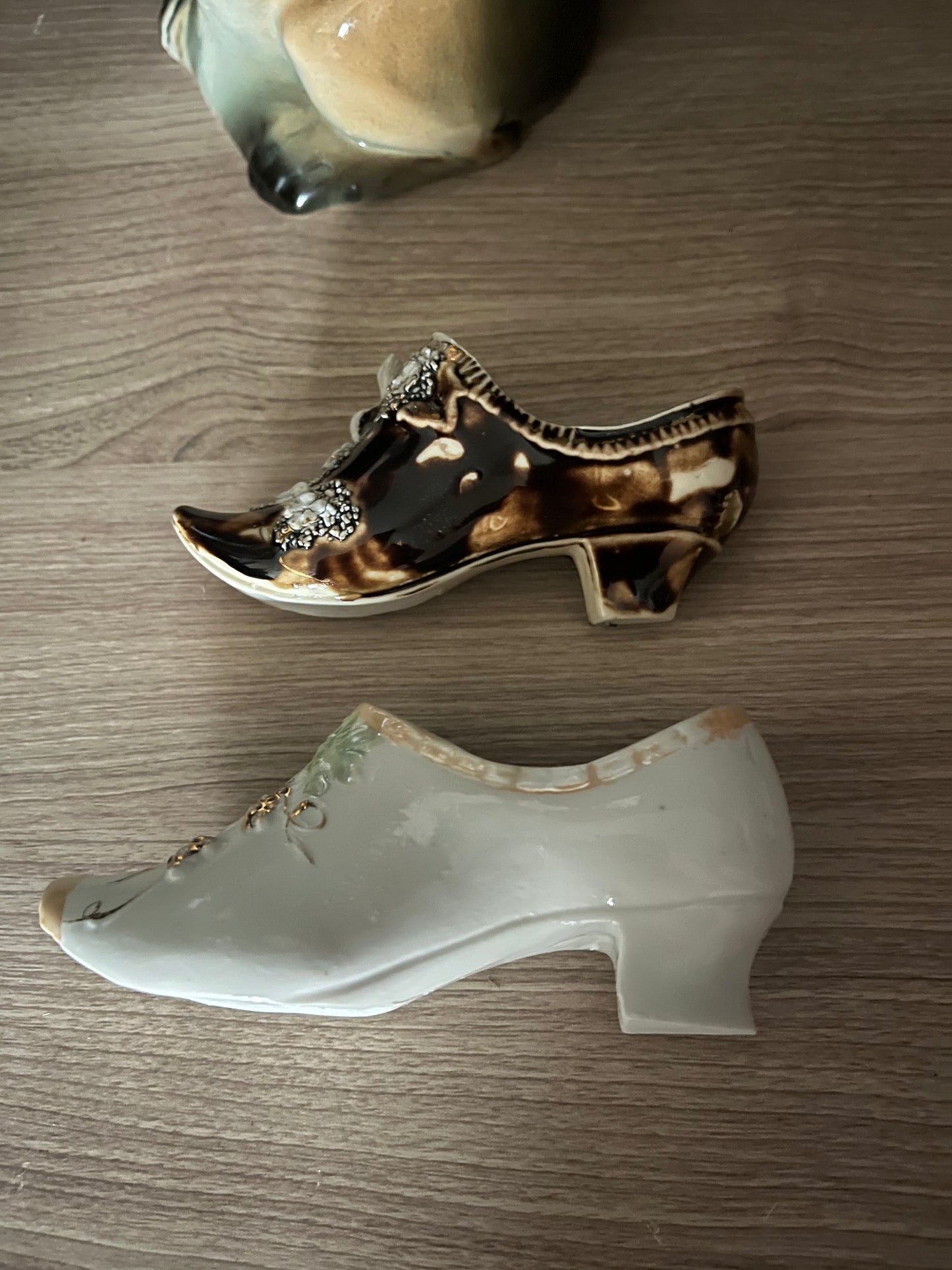 Set of 2 antique porcelain shoes